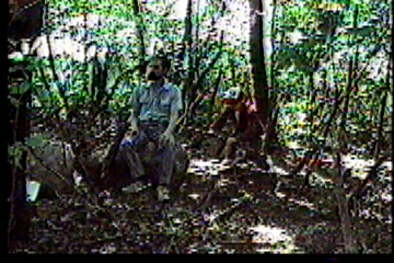 Another hunter sneaks up from behind and grabs Steve's rifle