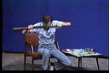 Steve in studio breaking gun over his knee