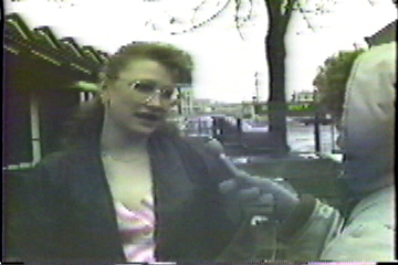 Interviewing another passer-by.