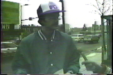 Interviewing another passer-by.